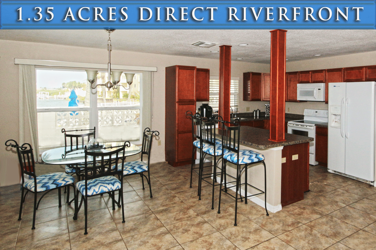 Riverfront homes for sale in Port Orange Florida. 1.35 acres beachside along the Intracoastal Waterway. Zoned Multifamily or Assisted Living Facility - Riverfront home Kitchen Dining Room